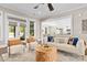 Bright and airy living room that flows into the kitchen and has lots of seating at 7181 Windy Ridge Dr, Iron Station, NC 28080