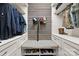 Spacious walk-in closet with built-in shelving, bench seating, and ample space for storage at 7181 Windy Ridge Dr, Iron Station, NC 28080