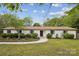 Charming single-story home with manicured landscaping and a welcoming walkway to the front door at 7200 Monroe Rd, Charlotte, NC 28212