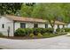 Well-maintained home exterior with mature landscaping and a long, modern design at 7200 Monroe Rd, Charlotte, NC 28212