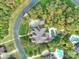 Beautiful aerial of estate with a pool, mature trees, and a large yard at 7311 Barrington Ridge Dr, Fort Mill, SC 29707