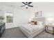Cozy bedroom with a comfortable bed, soft lighting, and a calming neutral color palette for a relaxing atmosphere at 7311 Barrington Ridge Dr, Fort Mill, SC 29707