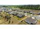Gorgeous aerial view showcases the neighborhood's lush landscaping, craftsman homes, and tranquil setting at 8018 Green Heron Ct, Belmont, NC 28012