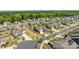 Attractive aerial view displays a modern neighborhood with well-kept lawns, craftsman homes, and mature trees at 8018 Green Heron Ct, Belmont, NC 28012