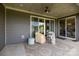 Covered patio featuring outdoor seating and a ceiling fan at 8018 Green Heron Ct, Belmont, NC 28012
