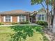 Charming brick home featuring well-maintained landscaping and a welcoming entrance at 8274 Windsor Ridge Dr, Charlotte, NC 28277