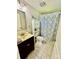 Bathroom featuring a vanity, toilet, and shower with a patterned shower curtain at 9007 Mcmillian Dr, Harrisburg, NC 28075