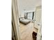 A bedroom with a bed, wood floors, and a window with natural light at 9007 Mcmillian Dr, Harrisburg, NC 28075