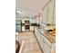 Modern kitchen featuring granite countertops, stainless steel appliances, and ample cabinet space at 9007 Mcmillian Dr, Harrisburg, NC 28075