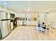 Well-lit kitchen with stainless steel appliances, granite countertops, and a cozy breakfast nook at 9007 Mcmillian Dr, Harrisburg, NC 28075