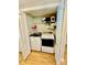 Well-organized laundry closet with washer, dryer, and shelving, enhancing convenience and storage at 9007 Mcmillian Dr, Harrisburg, NC 28075