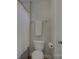 Neutral bathroom includes a standard toilet with a shower and towel rack at 9810 Daufuskie Dr, Charlotte, NC 28278
