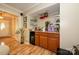 Wet bar with storage and counter space offers a place to entertain indoors at 10316 Whitethorn Dr, Charlotte, NC 28277
