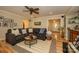 Inviting living room features hardwood floors, neutral walls, and comfortable seating at 10316 Whitethorn Dr, Charlotte, NC 28277
