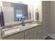 Elegant bathroom vanity with double sinks, granite countertop, and custom cabinetry at 107 Garden Ter, Dallas, NC 28034