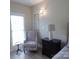 Comfortable bedroom setting with a floral chair, side table, and dark wood furnishings at 107 Garden Ter, Dallas, NC 28034