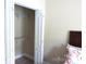 Well-organized walk-in closet with shelving for storage at 107 Garden Ter, Dallas, NC 28034