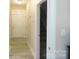 Well-lit hallway featuring clean lines and light-colored flooring at 107 Garden Ter, Dallas, NC 28034