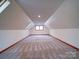 Spacious attic featuring neutral carpet, trim, and paint at 110 Dutch Creek Rd, Rockwell, NC 28138