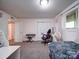 Bedroom with neutral walls and carpet, and a gaming desk set at 110 Dutch Creek Rd, Rockwell, NC 28138