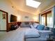 Large living room with skylight and slider to back porch at 110 Dutch Creek Rd, Rockwell, NC 28138