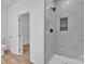 Bright bathroom featuring marble shower, sleek black fixtures, and modern design at 1119 Stanback Rd, Chester, SC 29730