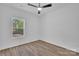 Bedroom with laminate floors, a fan, and a bright window at 1119 Stanback Rd, Chester, SC 29730
