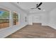 Bright living room featuring wood floors, windows, and back door at 1119 Stanback Rd, Chester, SC 29730