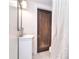 Bathroom with a sink, mirror, and a shower behind a curtain at 122 Corban Se Ave, Concord, NC 28025