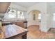 Charming kitchen with natural wood countertop, a stainless steel dishwasher and gas range at 122 Corban Se Ave, Concord, NC 28025