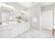 Modern bathroom with dual sinks, quartz countertops, and a large mirror at 13063 Arnold Palmer Cir # 839, Lancaster, SC 29720