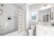 Bright bathroom features white subway tiles, shower-tub combo, and neutral-toned finishes at 13063 Arnold Palmer Cir # 839, Lancaster, SC 29720