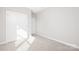 Bedroom featuring neutral carpeting and closets for ample storage at 13063 Arnold Palmer Cir # 839, Lancaster, SC 29720