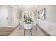 Elegant dining room featuring a modern glass table, stylish chairs, and contemporary decor at 13063 Arnold Palmer Cir # 839, Lancaster, SC 29720