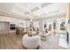 Open-concept living room and kitchen with modern finishes and plenty of natural light at 13063 Arnold Palmer Cir # 839, Lancaster, SC 29720