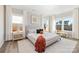 Serene main bedroom featuring large windows, a neutral color palette, and modern furnishings at 13063 Arnold Palmer Cir # 839, Lancaster, SC 29720