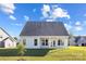 The rear exterior features a covered porch and large windows at 13279 Arnold Palmer Cir # 867, Lancaster, SC 29720