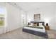 Serene bedroom with large windows, neutral tones, and stylish furnishings provides a relaxing retreat at 13279 Arnold Palmer Cir # 867, Lancaster, SC 29720
