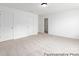 Expansive bedroom with neutral carpet and ample closet space, ideal for comfort at 13279 Arnold Palmer Cir # 867, Lancaster, SC 29720