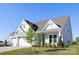 Attractive exterior view highlighting the architectural details and well-manicured landscaping at 13279 Arnold Palmer Cir # 867, Lancaster, SC 29720