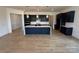 Modern kitchen with sleek cabinetry, a spacious center island, and stylish pendant lighting at 13279 Arnold Palmer Cir # 867, Lancaster, SC 29720