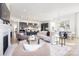 Spacious living room showcasing an open floor plan with modern furnishings and a gourmet kitchen at 13279 Arnold Palmer Cir # 867, Lancaster, SC 29720