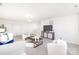 Spacious living room features neutral carpet, contemporary furnishings and ample seating at 13279 Arnold Palmer Cir # 867, Lancaster, SC 29720