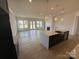 Bright open-concept with kitchen island and fireplace at 13279 Arnold Palmer Cir # 867, Lancaster, SC 29720