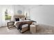 Serene main bedroom with plush carpeting, tray ceiling, and windows, creating a relaxing retreat at 13279 Arnold Palmer Cir # 867, Lancaster, SC 29720