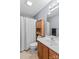 Neutral bathroom showcasing a vanity with drawers, mirror, and cabinet for storage at 140 Hazelwood Dr, Rockwell, NC 28138