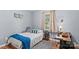 Cozy bedroom featuring a single bed, work space, and neutral decor at 140 Hazelwood Dr, Rockwell, NC 28138
