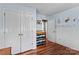 Bright Bedroom with spacious closet, changing station, and whimsical Winnie the Pooh wall art at 140 Hazelwood Dr, Rockwell, NC 28138