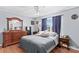 Bedroom featuring hardwood floors and large window with ample natural light at 140 Hazelwood Dr, Rockwell, NC 28138
