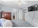Bedroom with hardwood floors, ceiling fan and attached bath at 140 Hazelwood Dr, Rockwell, NC 28138